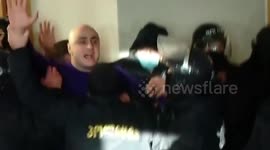 Riot police arrest Georgian opposition leader in party headquarters