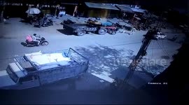 Motorcyclist wearing helmet avoids serious injury after collision with SUV in India