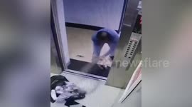 Elderly Chinese man seen dumping rubbish into elevator