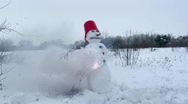 YouTuber films as they slowly demolish snowman using fireworks
