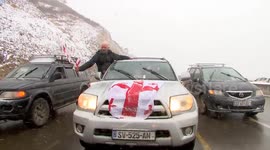 Convoy parades through streets in support of opposition leader arrested in Georgia