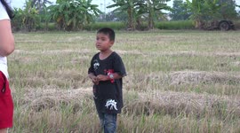 Ghosts spotted in a paddy field by a five year old boy in Thailand.