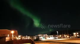 Stunning display of the Aurora Borealis, Northern Lights, dancing over Reykjavik in Iceland