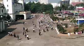 Myanmar military supporters attack anti-coup protesters in Yangon