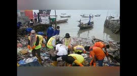 Indonesian students held campaign clean up plastic waste in coast Kenjeran, Surabaya, East Java