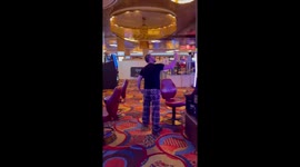 Guy goes crazy at casino after winning $10,000 on slot machine!
