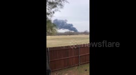 Warehouse fire leaves huge plume of smoke in Texas sky