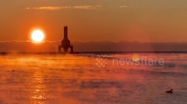 US: Stunning Golden Sunrise And Lake Mist In Port Washington, Wisconsin