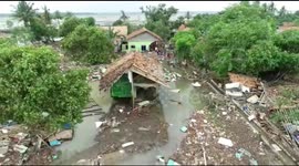 Repair work on embankment begins after floods plague West Java, Indonesia