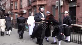 Small crowds celebrate Jewish holiday of Purim in Brooklyn