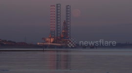 Stunning full Snow moon setting and misty Sunrise rising in Kent, UK