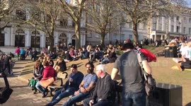 Crowds flock to UK parks despite deputy chief medical officer urging Britons not to relax