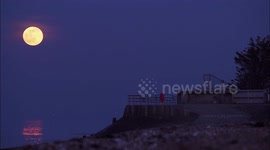 Stunning full Snow Moon rises over sea in Kent, UK