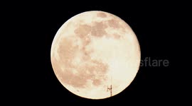 Full Snow Moon rises over Derbyshire Dales in England