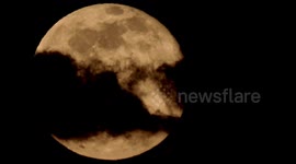 Full snow moon lights up sky over Swiss Alps