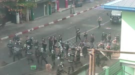 Myanmar police fire live rounds at protesters in deadly street battle