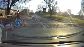 E-Scooter dangerously wheels out in front on van with 2 people on it - dash-cam footage