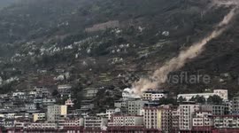 Rocks crash down mountain into houses, killing one resident in southern China