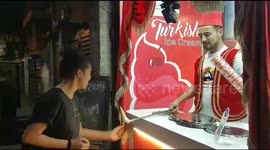 Moment woman is tricked into grabbing an ice-cream cone in Eastern India