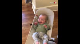 This baby cannot stop laughing at the noises made by pet dog