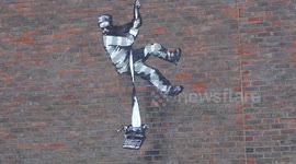 Possible Banksy piece appears on side of Reading prison