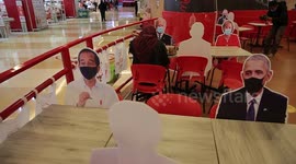 Indonesian restaurant uses cardboard cutouts of world leaders to enforce social distancing