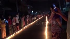 Yangon residents hold vigil for anti-coup protesters killed in Myanmar