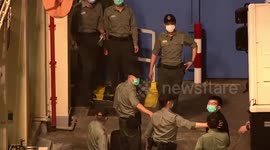 Hong Kong activist Joshua Wong charged with subversion arrive at detention centre