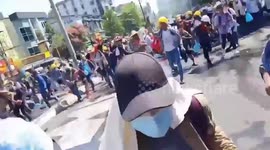 Protesters flee as Myanmar police fire tear gas and water cannon