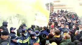 Minor scuffles as opposition parties hold rally outside parliament in Georgia
