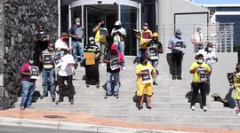 South Africa's ruling party holds anti-racism protest outside broadcaster's offices over mask incident