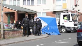 Police launch murder probe after man is stabbed to death in knife attack on suburban street in the early hours of the morning