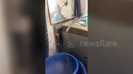 Ice comes out of water hose during cold spell in South Korea