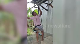 Farmers use transport pulley as fun zipline ride to move between fields