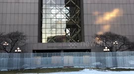 Barricades set up outside Minneapolis courthouse as officer charged with killing George Floyd awaits trial