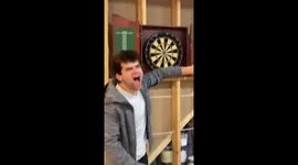 Darts highjinks ends with painful, freak bullseye to the middle finger