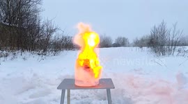 Fizzling sodium shatters ice container in explosive experiment