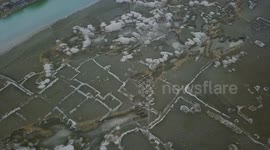 Submerged ancient village appears after reservoir dries up due to drought in east China