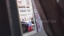 Terrified Myanmar residents barricade themselves inside shop as security forces charge through streets