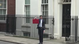 Rishi Sunak leaves 11 Downing Street to reveal the budget