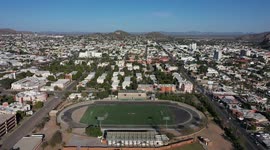 Aerial view of Cerro de la Campana at sunset against light in the city of Hermosillo, Mexic