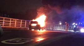 Burning car in East London, UK.
