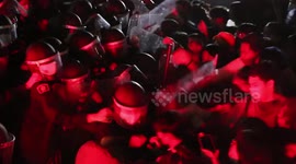 Pro-democracy protesters scuffle with police in northern Thailand