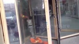 Firefighters rescue boy after his arm gets stuck in revolving door at Chinese mall