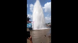 Burst pipe sends water gushing 20 feet into air on southern Indian road