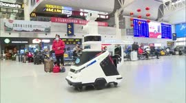 Robot used to disinfect and check commuters' temperatures at Chinese railway station