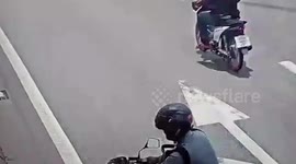 Broken-down pickup truck jolts forward hitting motorcycle rider who stopped to help