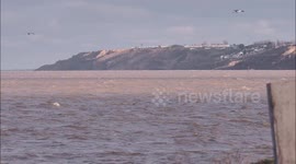 Sheppey Cliff winter erosion leaves holiday & residential homes at risk in Kent, UK