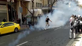 Greek police user water cannon to disperse supporters of jailed hit man