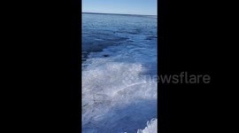 Mesmerising footage shows ice breaking up on shore of Lake Superior